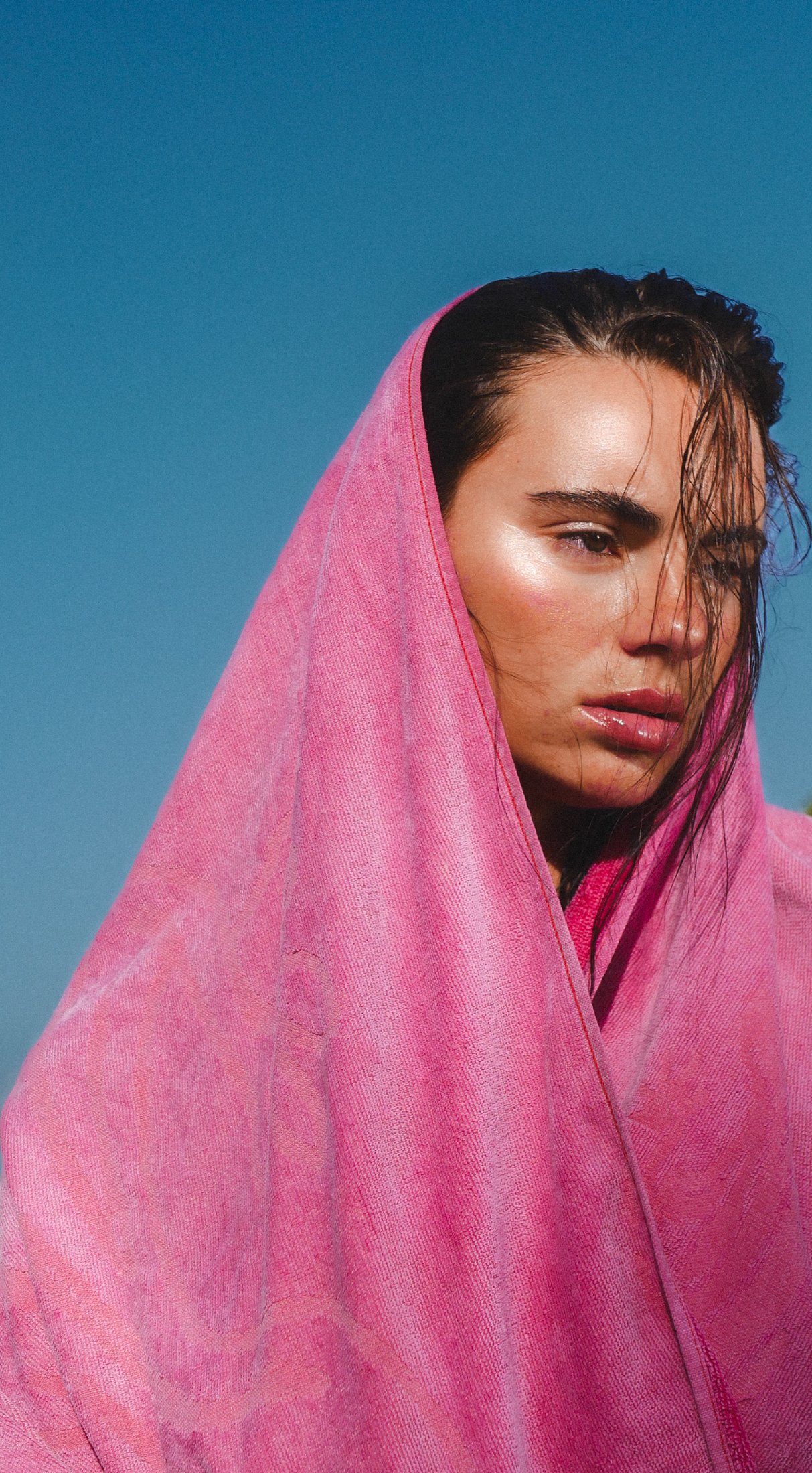 Anne Charlotte, portrait — pink towel wrapped over her head and shoulders